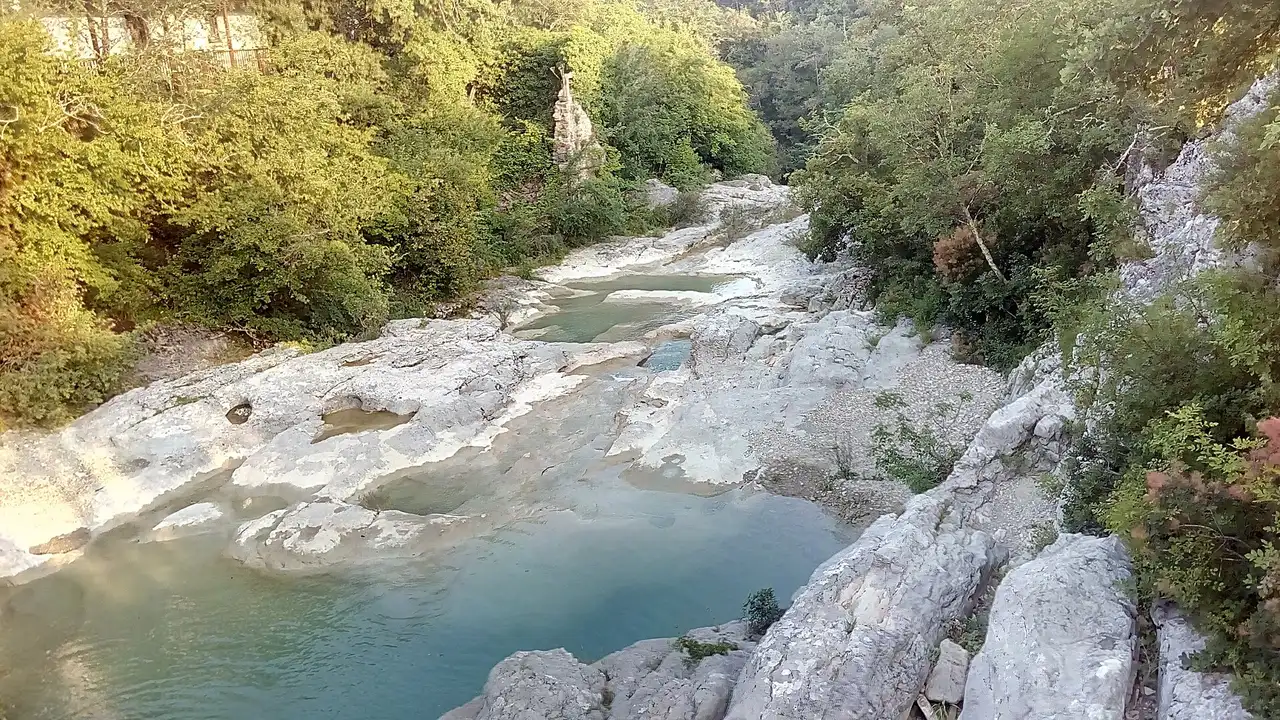 The Mirna river running through the cauldron pools and old mill of the village of Kotli in Istria